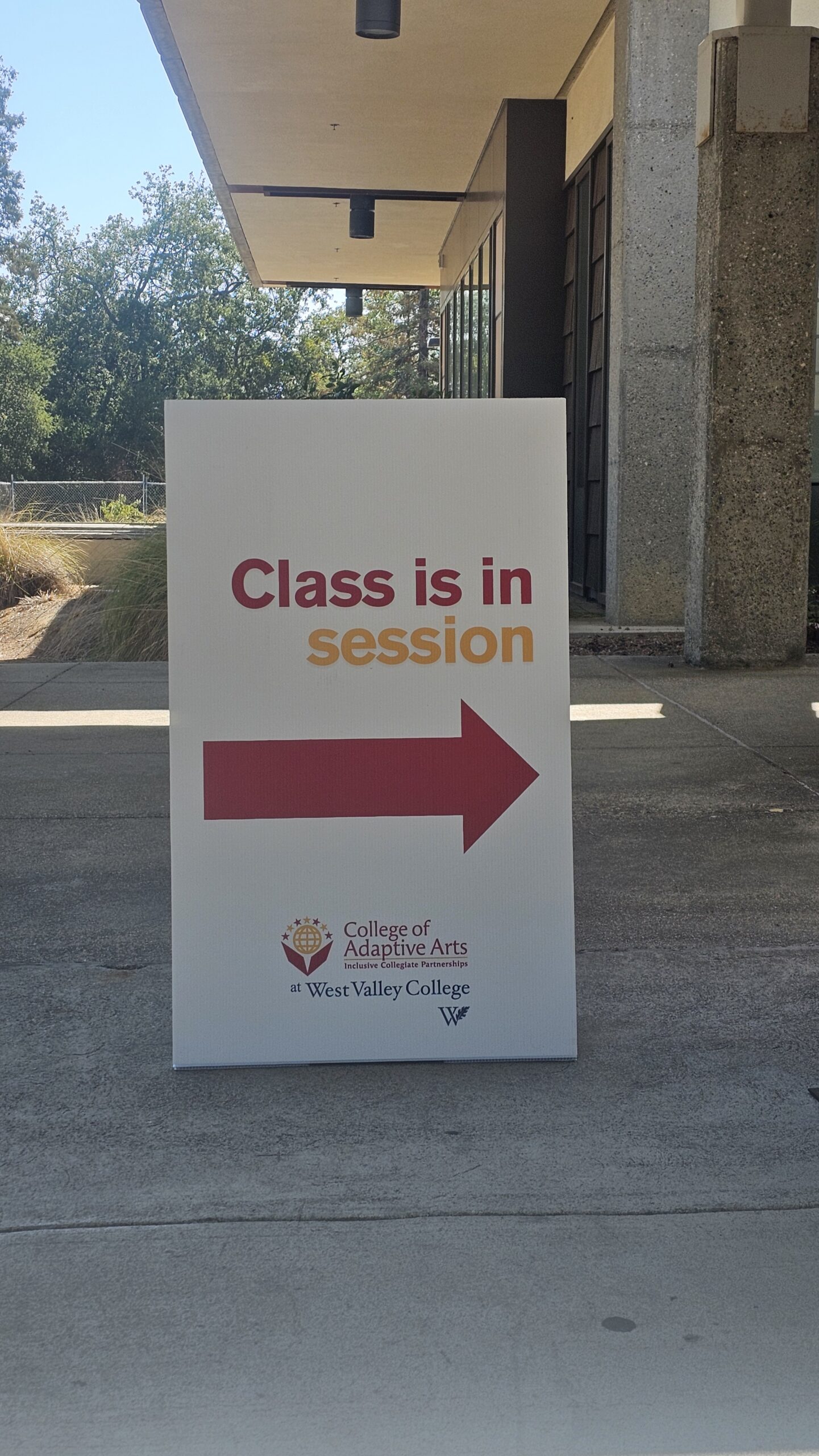 A 'Class is in session' sign outside a CAA classroom