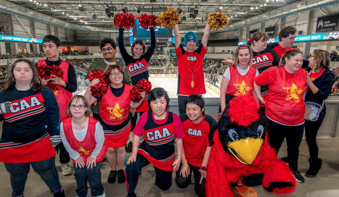Students cheering at hockey game