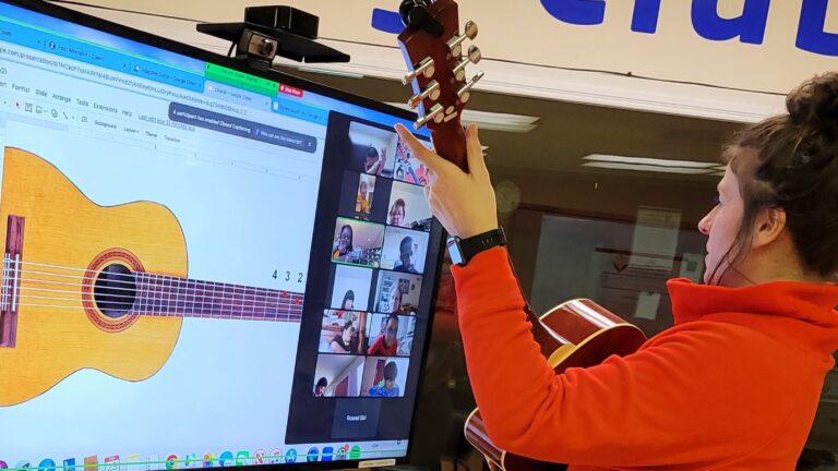 jessica playing guitar